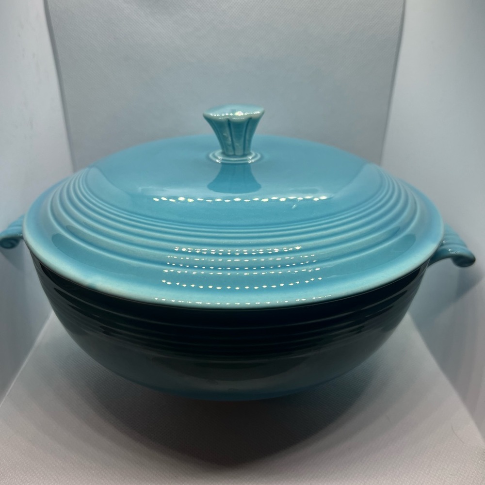 Vintage Fiestaware covered casserole in original turquoise no chips or cracks.